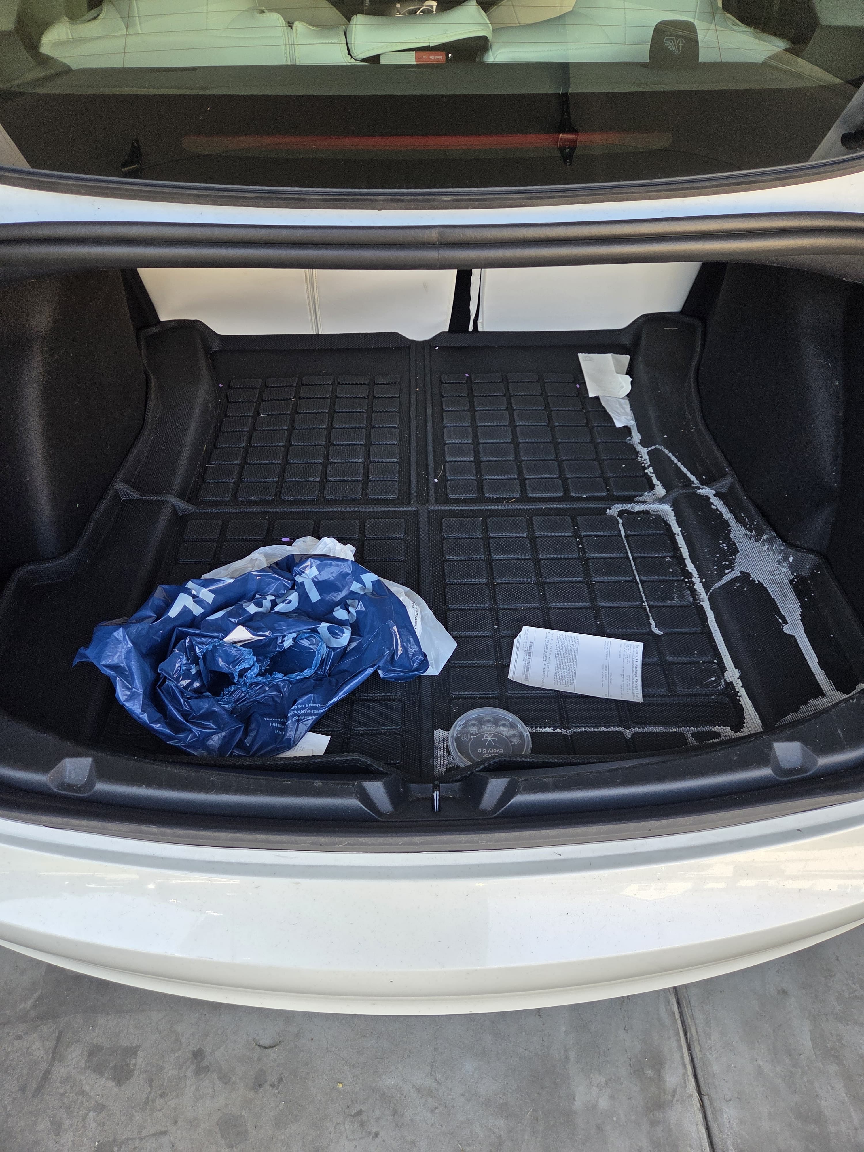 Tesla trunk before detailing